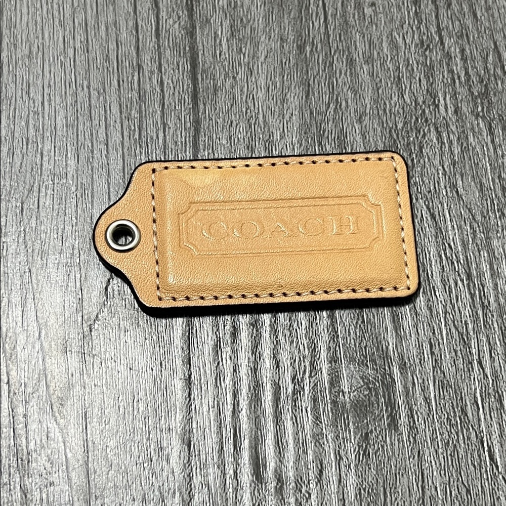 Coach Beige Leather purse, charm keychain.
